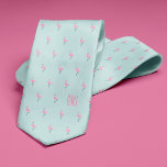 Cravate Flamants roses Monogramme Bleu clair<br><div class="desc">Des palmiers sur un arrière - plan bleu marine. Personnalisez avec un monogramme pour en faire un cadeau parfait. Vous cherchez une couleur différente ? Pas de problème ! Cliquez simplement sur le bouton "Personnaliser" et sélectionnez la couleur arrière - plan de votre choix.</div>