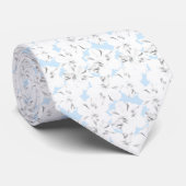 Cravate Fleurs blanches sur bleu clair. (Roulé)