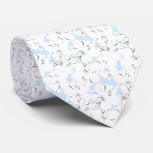 Cravate Fleurs blanches sur bleu clair.