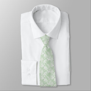 Cravate Fleurs blanches sur vert clair.