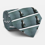 Cravate Le pingouin de Galapagos sur la roche de lave (Roulé)