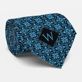 Cravate Monogramme bleu clair et noir arabesque (Roulé)