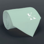 Cravate Monogramme Élégant Pistache Vert   Nom Un Côté<br><div class="desc">Une élégante cravate à un côté avec un monogramme blanc audacieux à travers un arrière - plan Pistachio Green. En plus de ce monogramme est inscrit votre prénom ou nom de famille dans toutes les capitales. Si vous préférez un look plus audacieux pour le nom personnel à l'intérieur de la...</div>