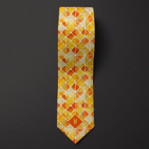 Cravate Monogramme géométrique orange et jaune brûlés