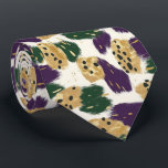 Cravate Motif de brosses vert violet or<br><div class="desc">Le Cravate Motif Green Purple Gold Brushstrokes est un accessoire audacieux qui ajoute une touche artistique à toute tenue. Avec son mélange éclatant de motifs verts, violets et dorés, cette cravate apporte un élément de créativité et de sophistication à votre garde-robe. Les couleurs luxueuses sont parfaites pour faire une déclaration...</div>