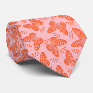 Cravate Motif papillon orange sur arrière - plan rose