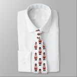 Cravate Noisette de Noël<br><div class="desc">Un amusant motif de noix de Noël rouge, noir et blanc décore cette cravate. Amusant pour la saison des fêtes. Conçu pour vous par Blackberry Boulevard.</div>