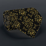 Cravate Shiny Gold And Black Vintage Swirls Pattern<br><div class="desc">Add a touch of sophistication and charm to your outfit with our exquisite gold-toned vintage floral swirls pattern on a sleek black background. This versatile necktie is perfect for any occasion,  ensuring you stand out in style.</div>