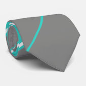 Cravate turquoise et argentée diagonalement rayée (Roulé)