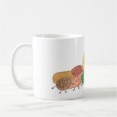 Créatures mignonnes et duveteuses sur un mug (Gauche)