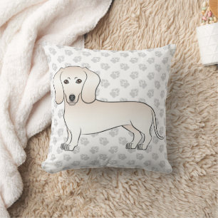 Crème gladharige dachshond cartoonhond met poten kussen