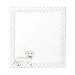 Crème gladharige dachshond cartoonhond met poten notitieblok
