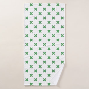 Croix verte coutures sur blanc