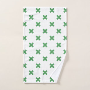 Croix verte coutures sur blanc