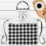 Cuisine pliée de buffle noir et blanc, texte perso<br><div class="desc">Faites-vous posséder ce magnifique tablier motif noir et blanc à damiers,  avec la possibilité de customiser les quatre zones de texte avec votre propre message! Conception avec une belle zone pour votre texte,  rehaussée de spatule,  mélange de bols,  fourche et whisk détails. Une idée cadeau unique !</div>