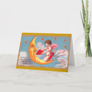 Cupido voedt hart naar maan Valentijn Feestdagen Kaart