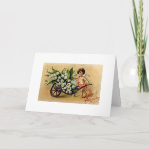 Cupidon victorien avec la carte de Saint-Valentin