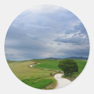 Curvale weg naar een bestemmingsronde sticker