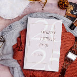 Custom Cute Pink Minimal 2025 Calendar  Planner<br><div class="desc">Stay organized in style with this elegant 2025 Zazzle planner. Featuring a modern, minimalist design with soft, earthy tones and a bold "2025" on the cover, this planner is perfect for keeping track of your daily schedule, goals, and important events. The sleek spiral binding ensures easy use, while the customizable...</div>