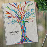 Custom de Tree Of Life Rainbow<br><div class="desc">Ce planificateur unique est décoré d'un arbre de vie aux couleurs vives sur un arrière - plan gris pâle. Le design original a été réalisé en mosaïque à l'aide de minuscules morceaux de verre aux couleurs vives. Customisez-le avec votre nom et votre année. Mosaïque originale © Michele Davies.</div>