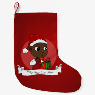 Cute African American baby met een kerstpet Kleine Kerstsok