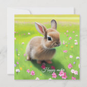 Cute baby rabbit in een bloemwei (Voorkant)