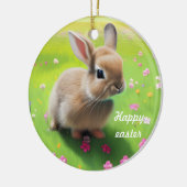 Cute baby rabbit in een bloemwei keramisch ornament (Links)