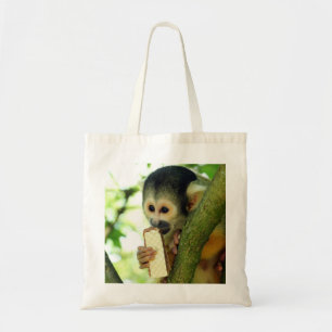 Cute Baby Squirrel Monkey die een Wafer Biscuit ee Tote Bag