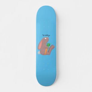 Cute bunny rabbit, zittend met wortelcartoon skateboard