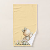 cute bunny with Easter eggs in a flower meadow (Serviette à main)