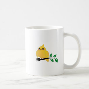 Cute cockatiel met een vork koffiemok