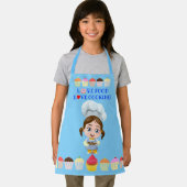 Cute cook cartoon personage met cupcakes schort (Insitu)