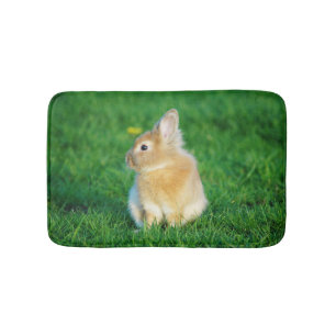 Cute Fawn Bunny Sitting in Grass Badmat