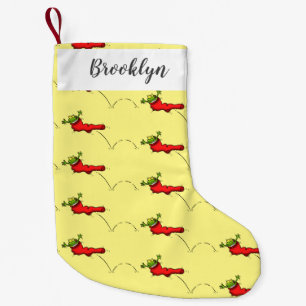 Cute frog in een rode sock springende cartoon kleine kerstsok