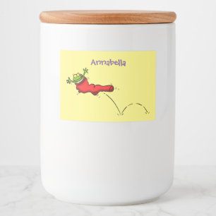 Cute frog in een rode sock springende cartoon voedselcontainer etiket