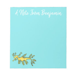 Cute funny leafy sea draak cartoon illustratie notitieblok