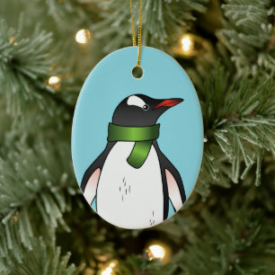 Cute Gentoo Penguin die een groen karf op blauw he Keramisch Ornament