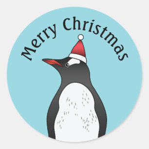 Cute Gentoo Penguin die een kersthat op blauw heef Ronde Sticker