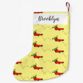 Cute grenouille dans une chaussette rouge saut de  (Dos)