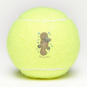 Cute happy baby platypus cartoon illustratie tennisballen