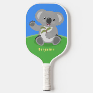 Cute happy koala waving cartoon illustratie pickleball paddle