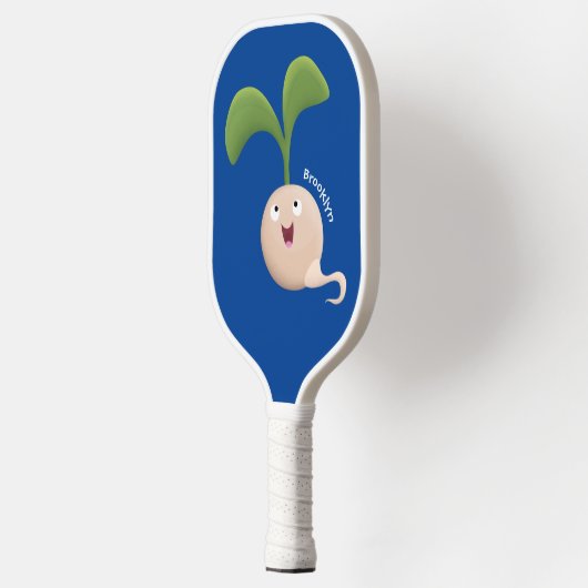 Cute happy seed cartoon illustratie pickleball paddle (Links)