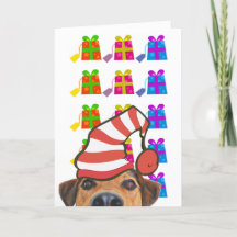 Cute hond met kerstmuts en cadeaus Kerstkaart