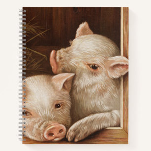 Cute little piglets in a barn at the farm notitieboek