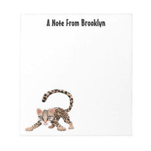 Cute ocelot cartoon illustratie notitieblok