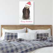 Cute Otter die met Kerstmis een kerstman heeft. Canvas Afdruk (Insitu (Slaapkamer))