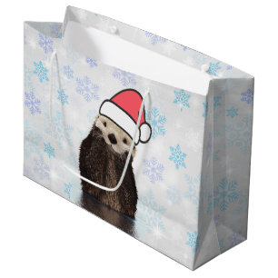Cute Otter die met Kerstmis een kerstman heeft. Groot Cadeauzakje