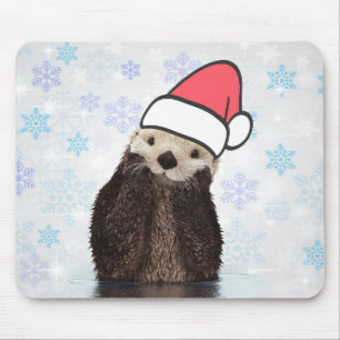 Cute Otter die met Kerstmis een kerstman heeft. Muismat