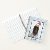 Cute Otter die met Kerstmis een kerstman heeft. Notitieboek (Binnen)