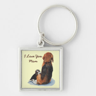 Cute puppy beagle die mam beuzelt sleutelhanger